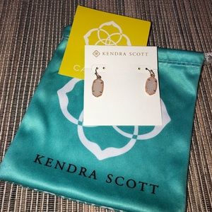 Kendra Scott gold drop drusy earrings.